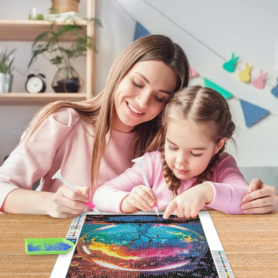 Diamond painting eigen foto die wordt gemaakt met dochter