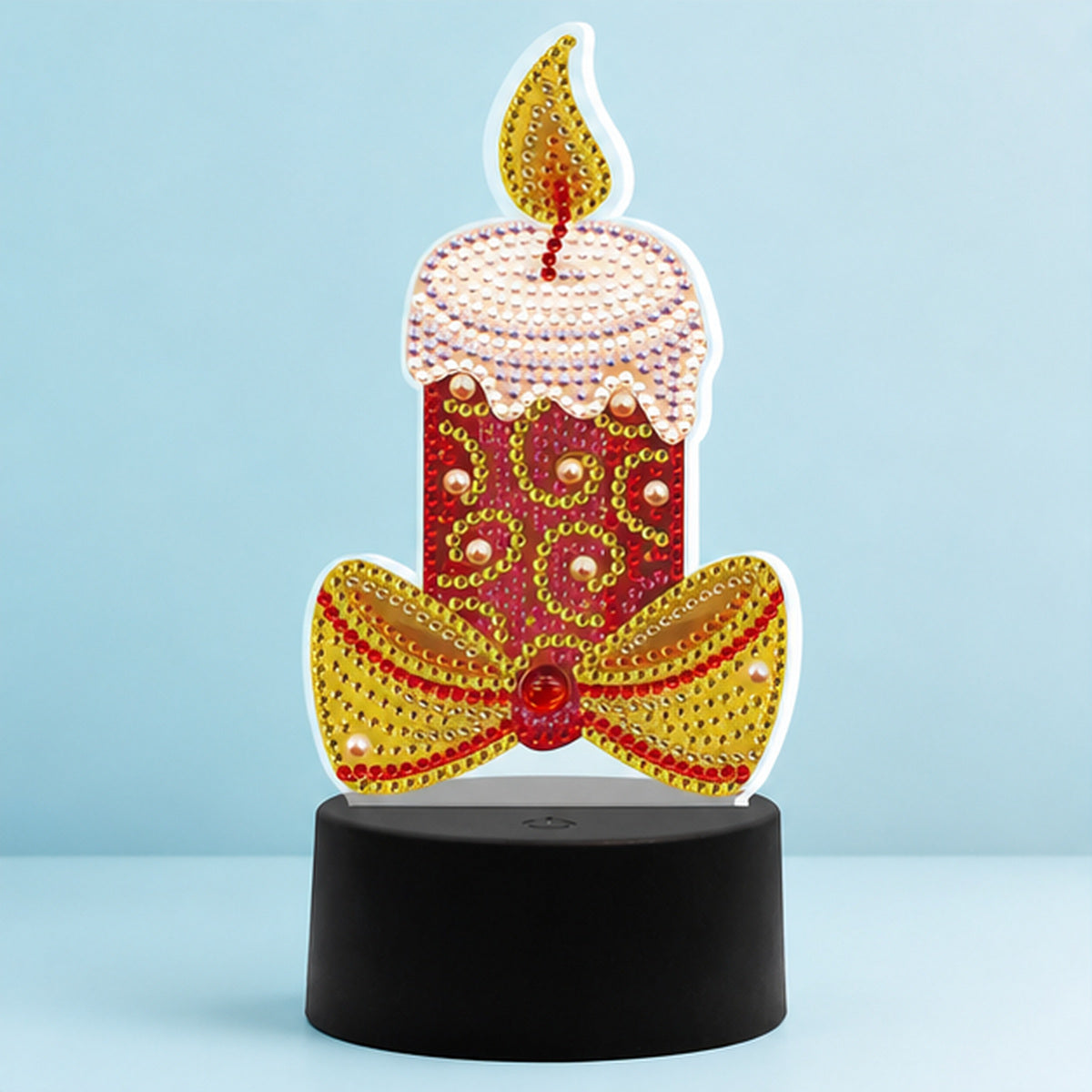 Diamond Painting Lamp Kaars op een lichtblauwe achtergrond