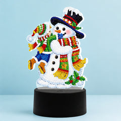 Diamond Painting Lamp Sneeuwman Kind op een lichtblauwe achtergrond