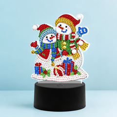 Diamond Painting Lamp Sneeuwmannetjes op een lichtblauwe achtergrond