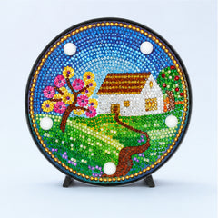 Diamond Painting Rond Lampje Mandala Huis op een lichtblauwe achtergrond