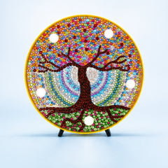 Diamond Painting Rond Lampje Mandala Levensboom op een lichtblauwe achtergrond