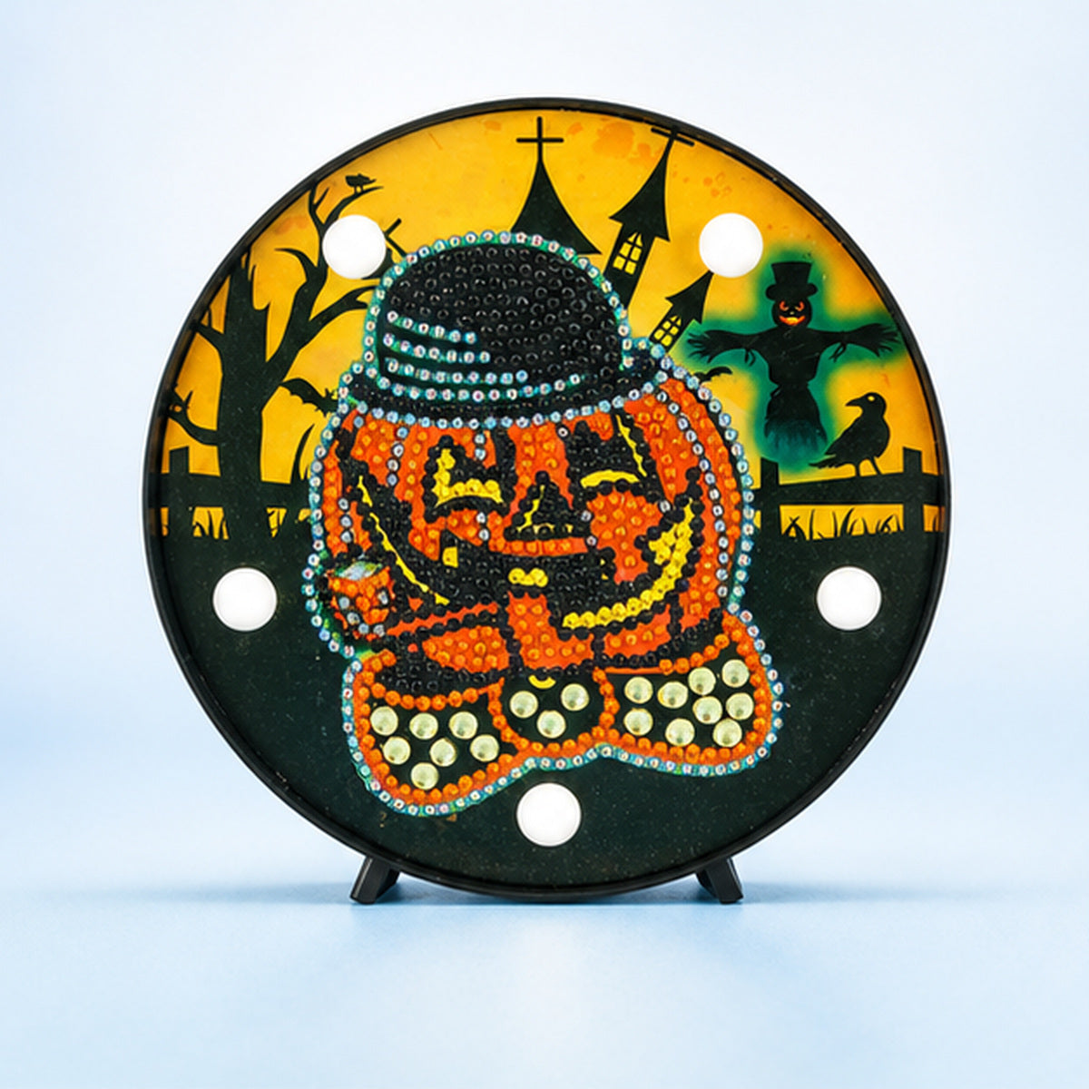 Diamond Painting Rond Lampje Mr. Pompoen op een lichtblauwe achtergrond