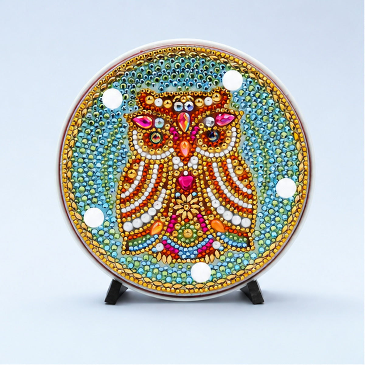 Diamond Painting Rond Lampje Slaperige Uil op een lichtblauwe achtergrond